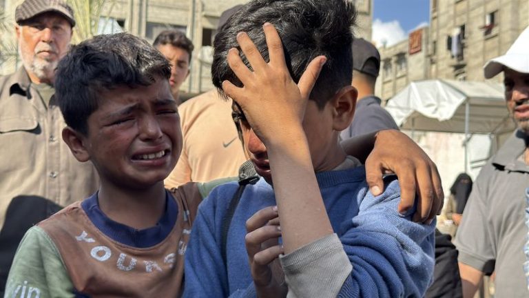 Dozens of Palestinians killed near Gaza aid distribution point, health officials say, in third day of shooting